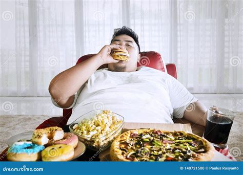 fat man on sofa